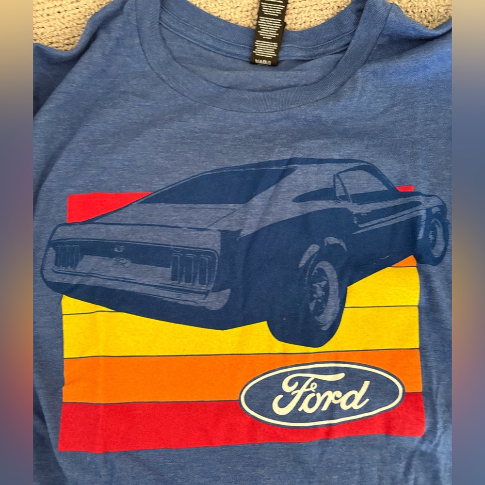 Ford Mustang Blue T-Shirt with Graphic Design Women’s L. Unworn but washed.